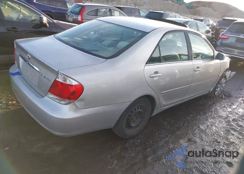 2005 Toyota Camry Le z USA, uszkodzony, nr VIN 4T1BE30K25U956931